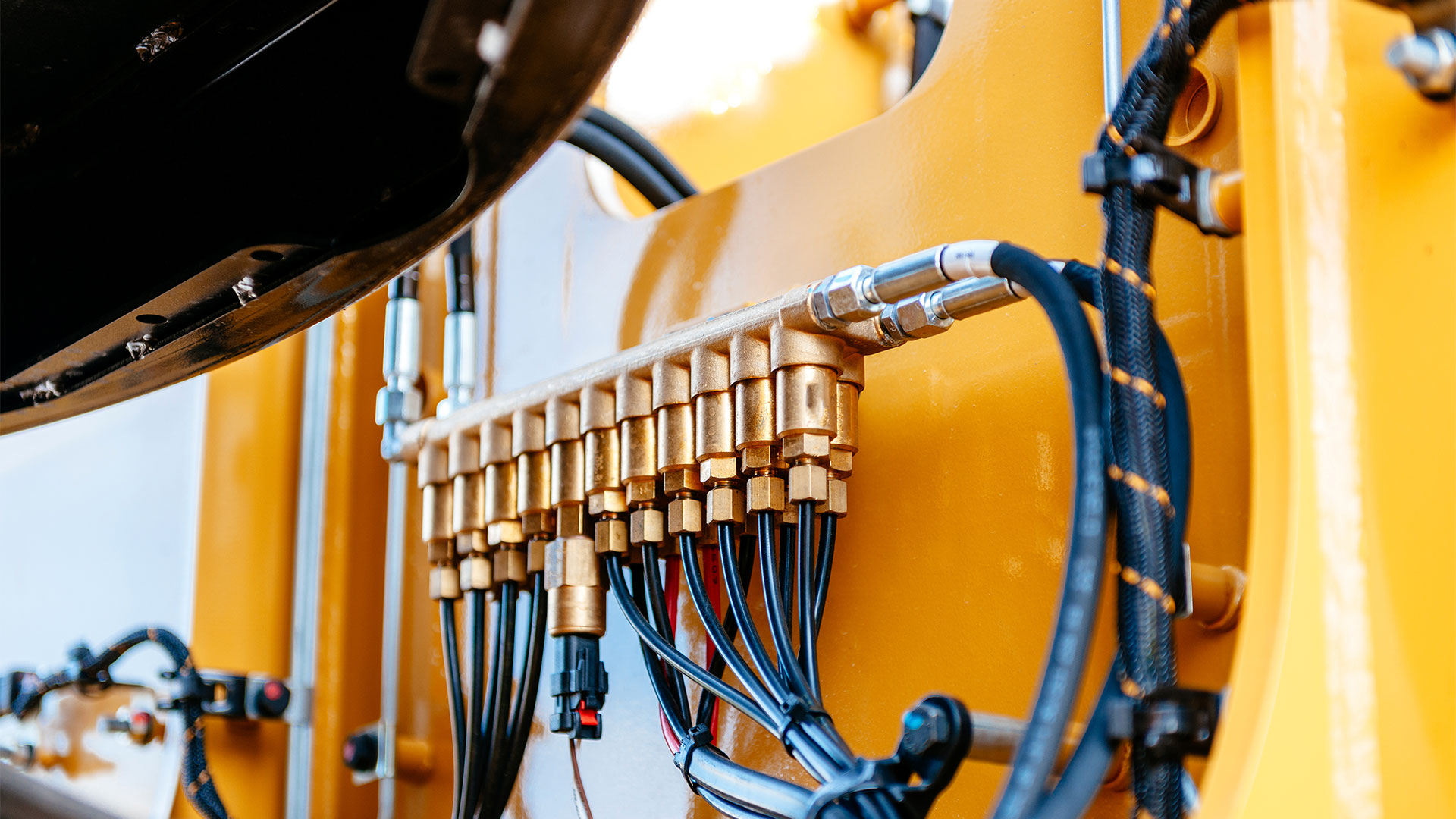 close up of excavator hydraulics